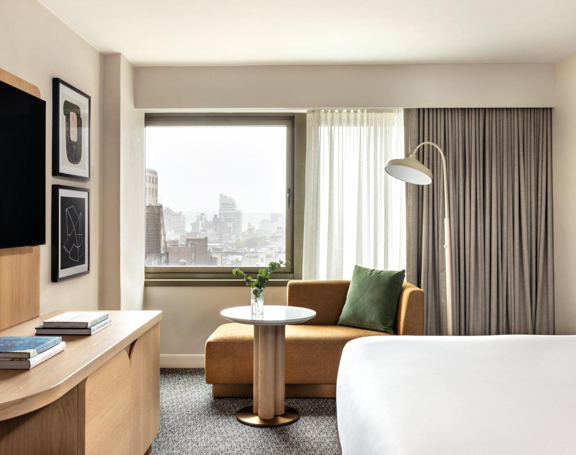 نزل هيلتون غاردن تايمز سكوير نيو يورك المظهر الخارجي الصورة A guest room at the Hotel Commonwealth